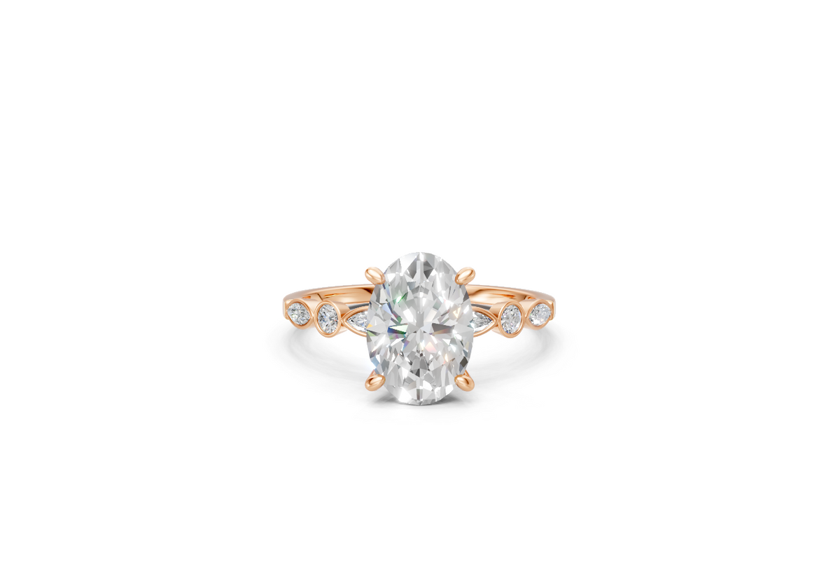 Oval-Cut Ring with Pear & Round Side Stones