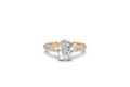 Oval Solitaire Ring with Baguette Diamond Band