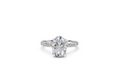 Oval-Cut Solitaire Ring with Diamond Band