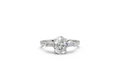 Oval-Cut & Tapered Baguette Diamond Trilogy Ring