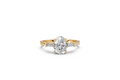 Oval-Cut & Tapered Baguette Diamond Trilogy Ring
