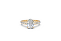 Oval Solitaire Ring with Baguette Diamond Band