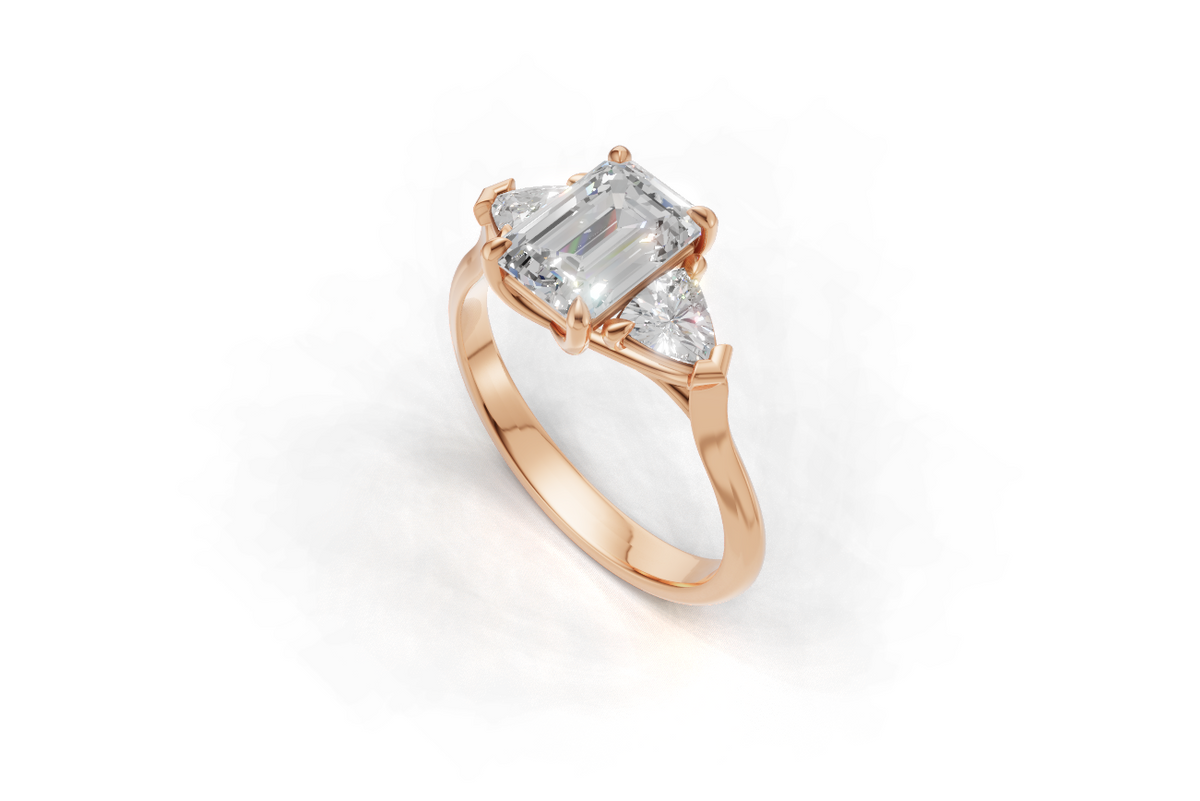 Emerald-Cut & Trillion Trilogy Ring
