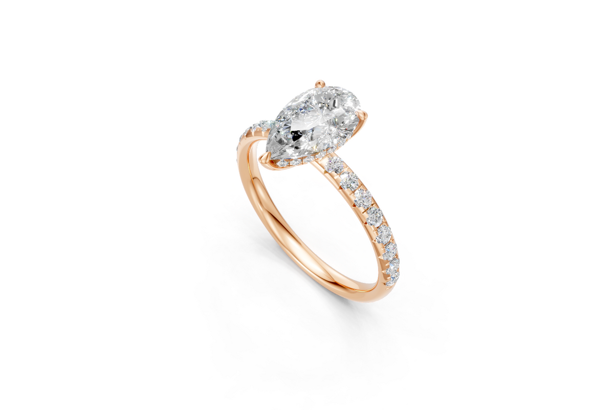 Pear-Cut Diamond Solitaire Ring with Diamond Band