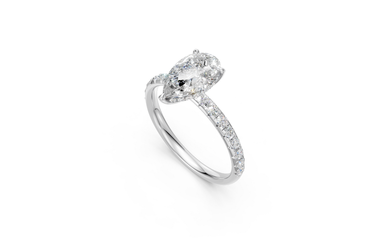 Pear-Cut Diamond Solitaire Ring with Diamond Band