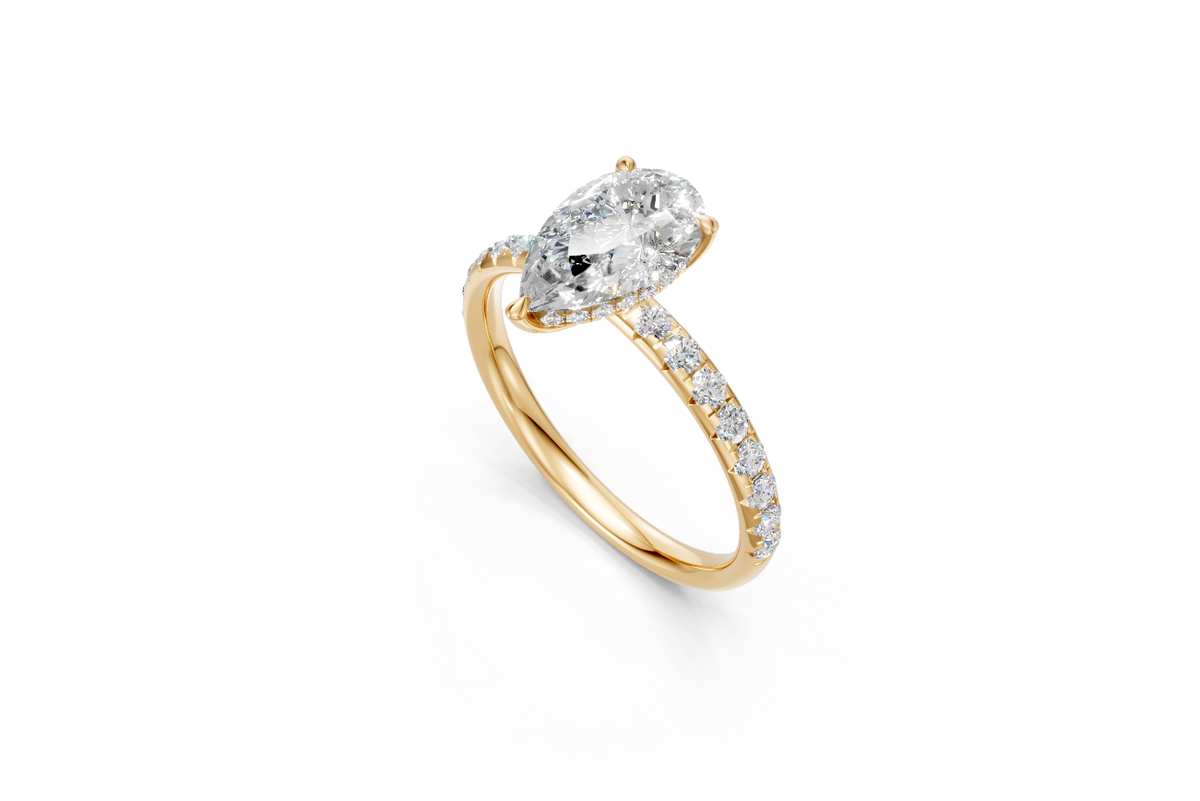 Pear-Cut Diamond Solitaire Ring with Diamond Band