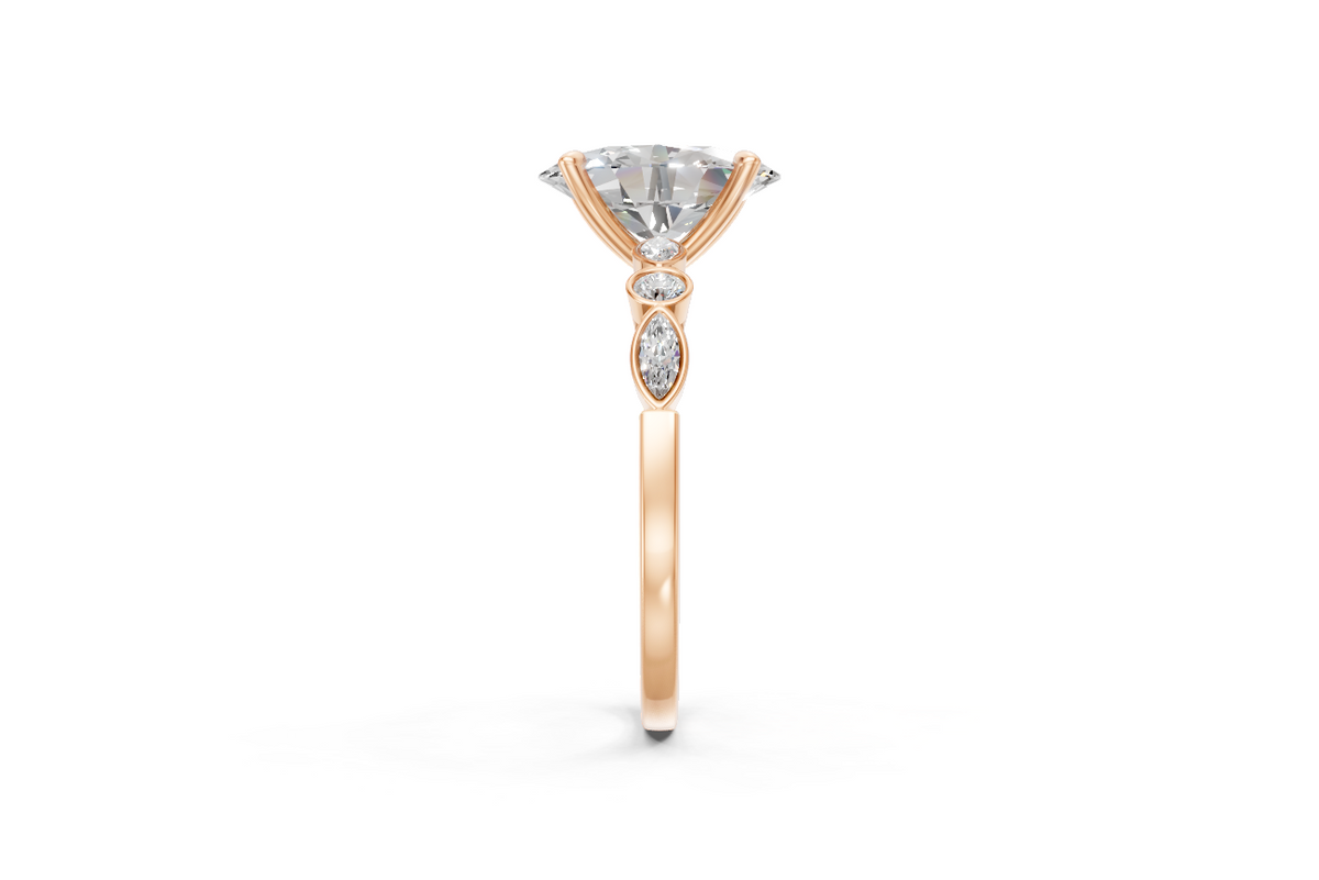 Oval-Cut Ring with Pear & Round Side Stones