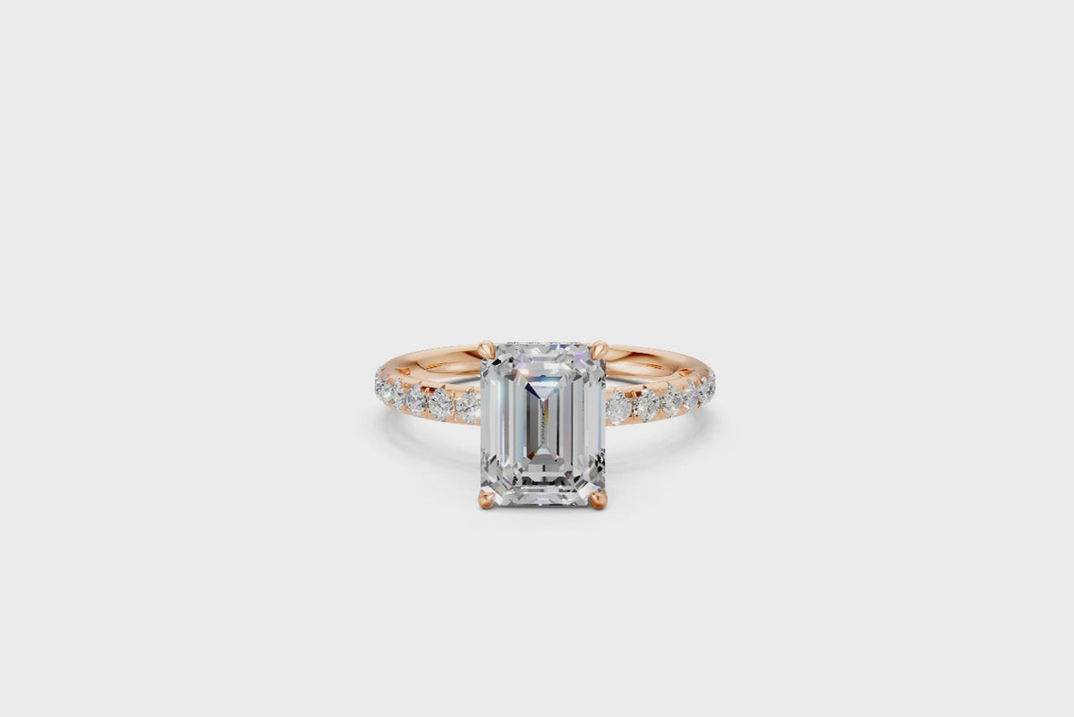 Emerald-Cut Solitaire Ring with Diamond Band