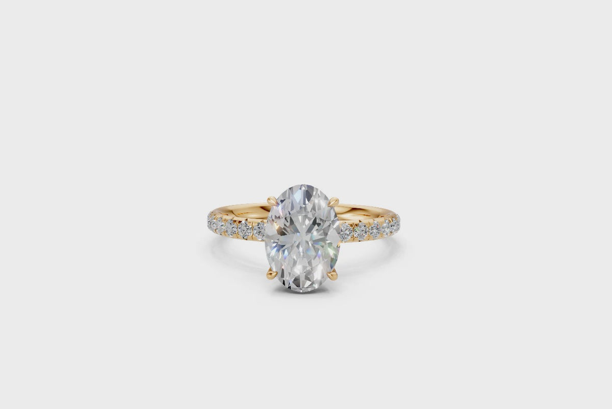 Oval-Cut Solitaire Ring with Diamond Band