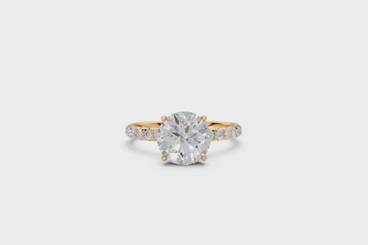 Round-Cut Solitaire Ring with Diamond Band