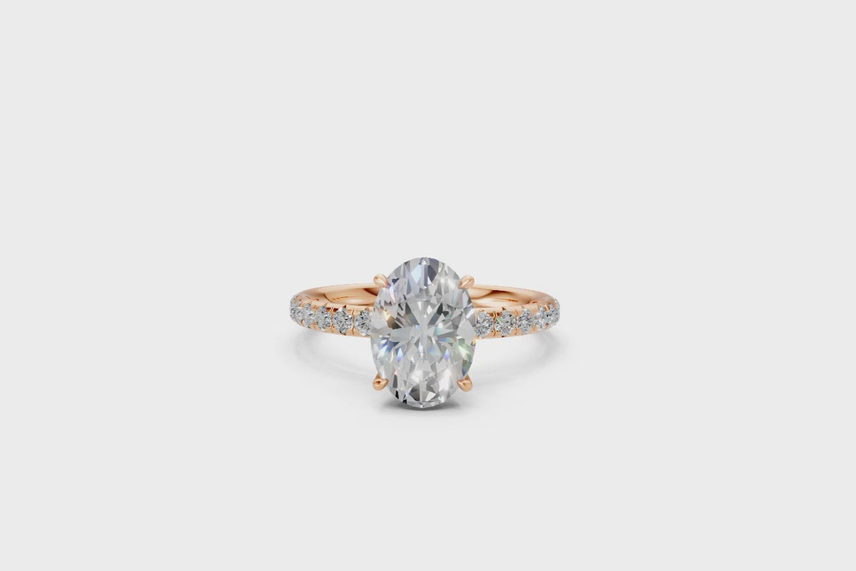 Oval-Cut Solitaire Ring with Diamond Band