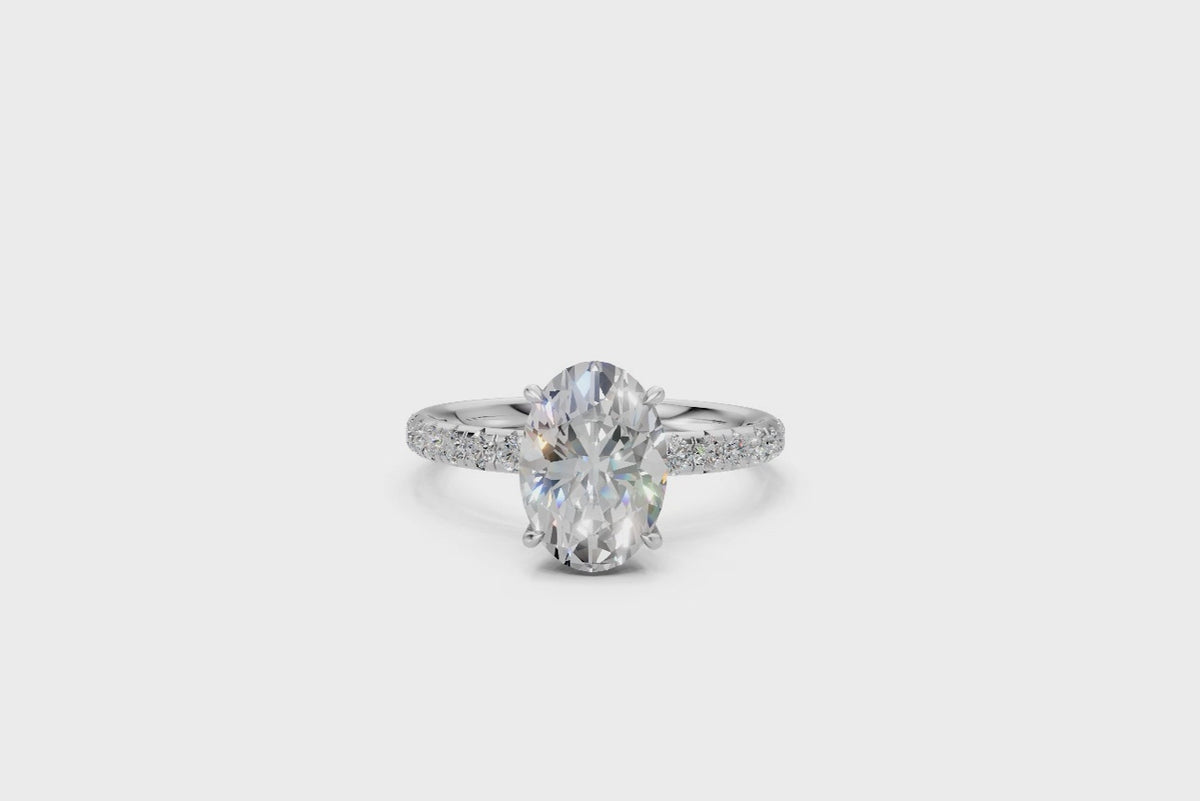 Oval-Cut Solitaire Ring with Diamond Band