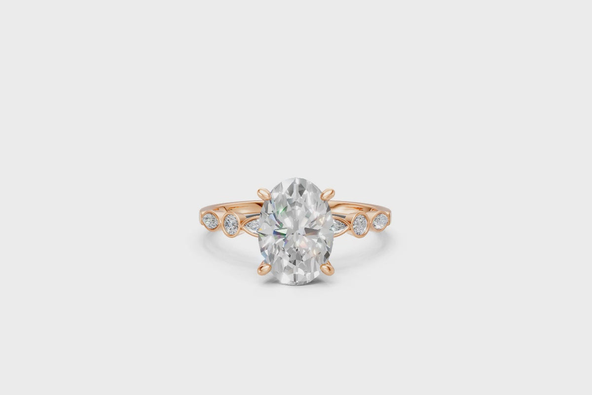 Oval-Cut Ring with Pear & Round Side Stones