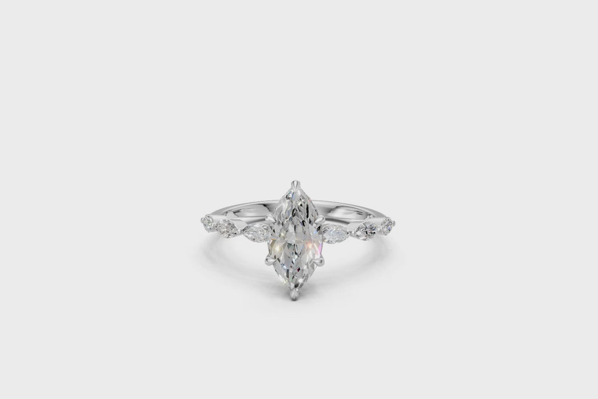 Marquise-Cut Solitaire Ring with Marquise Diamond Band