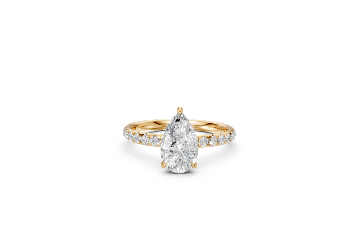 Pear-Cut Diamond Solitaire Ring with Diamond Band
