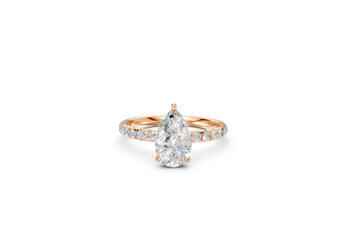 Pear-Cut Diamond Solitaire Ring with Diamond Band